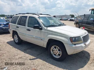2004 Jeep Grand Cherokee Laredo with VIN 1J4GX48S94C222249, listed as a IAAI auction lot 42598242 with 196,745 mi miles and . Bid and sale history available at DreamBid. Image 1.