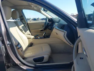 2014 BMW 3 Series 328i with VIN WBA3C1C57EK116483, listed as a IAAI auction lot 42697759 with 113,010 mi miles and . Bid and sale history available at DreamBid. Image 5.