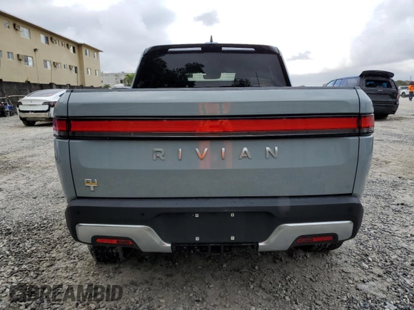 2022 Rivian R1T Launch Edition z VIN 7FCTGAALXNN004228, wystawiony jako Copart lot #43226985 z przebiegiem 4 mil mil oraz Szkody całkowita. Historia ofert i sprzedaży dostępna na DreamBid. Obrazek 6.