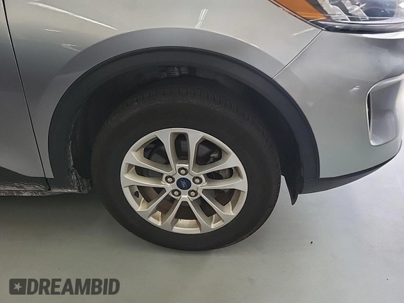 2022 Ford Escape SE with VIN 1FMCU9G65NUB32764, listed as a IAAI auction lot 42806882 with 81,565 mi miles and . Bid and sale history available at DreamBid. Image 34.