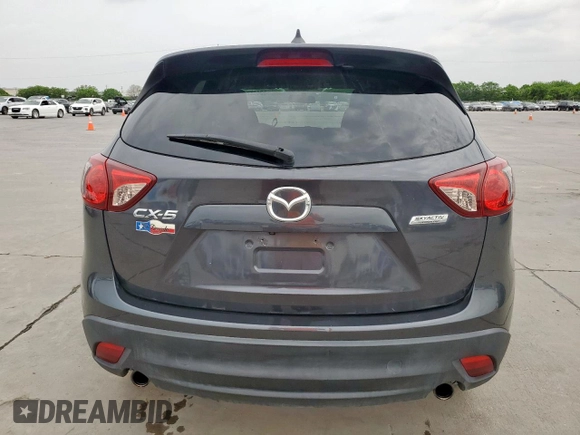 2016 Mazda CX-5 Touring z VIN JM3KE2CY7G0654292, wystawiony jako Copart lot #53433745 z przebiegiem 168 273 mil mil oraz Szkoda całkowita • Salvage title. Historia ofert i sprzedaży dostępna na DreamBid. Obrazek 6.