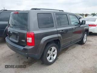 2014 Jeep Patriot Latitude with VIN 1C4NJRFB3ED810819, listed as a IAAI auction lot 41994129 with 145,733 mi miles and . Bid and sale history available at carsss.com. Image 4.