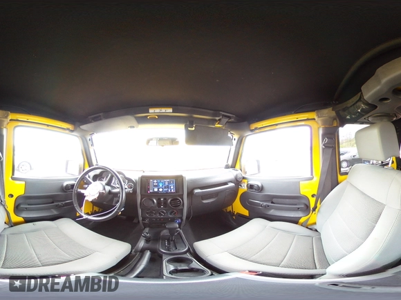 2009 Jeep Wrangler Unlimited Rubicon with VIN 1J8GA69109L761089, listed as a Copart auction lot 57975985 with 195,530 mi miles and Salvage title. Bid and sale history available at DreamBid. Image 15.