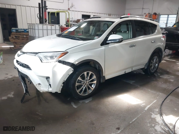 2018 Toyota RAV4 Limited with VIN JTMDFREV8JD235765, listed as a IAAI auction lot 41312430 with 205,732 mi miles. Bid and sale history available at carsss.com. Image 17.