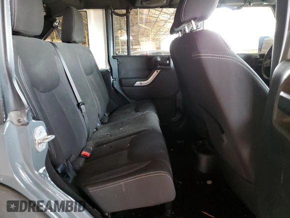 2014 Jeep Wrangler Unlimited Rubicon with VIN 1C4BJWFG4EL141706, listed as a Copart auction lot 51305235 with 106,919 mi miles and Salvage Title. Bid and sale history available at carsss.com. Image 10.