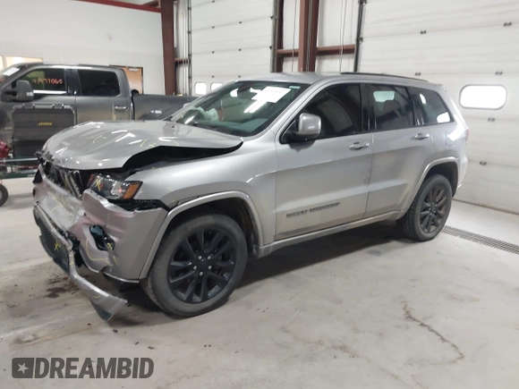 2018 Jeep Grand Cherokee Laredo E with VIN 1C4RJFAG6JC102969, listed as a IAAI auction lot 41963137 with 112,361 mi miles and . Bid and sale history available at DreamBid. Image 22.