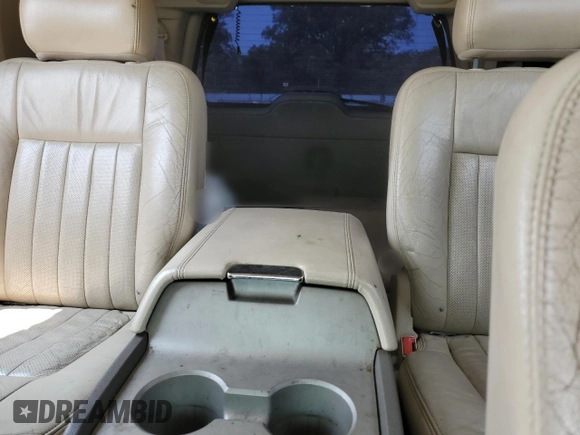 2004 Lincoln Navigator Luxury with VIN 5LMFU28R74LJ09128, listed as a Copart auction lot 59023625 with 181,658 mi miles and Salvage title. Bid and sale history available at DreamBid. Image 10.