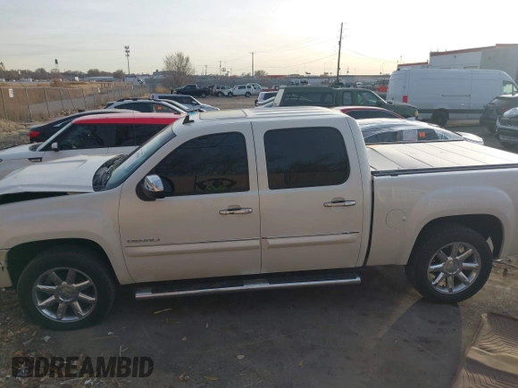 2011 GMC Sierra 1500 Denali z VIN 3GTP2XE20BG152905, wystawiony jako IAAI lot #41079419 z przebiegiem 158 192 mil mil oraz . Historia ofert i sprzedaży dostępna na DreamBid. Obrazek 15.
