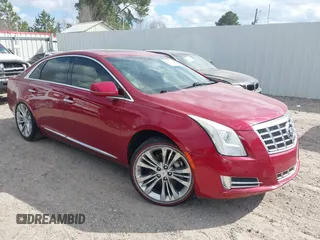 2015 Cadillac XTS Luxury with VIN 2G61M5S3XF9126736, listed as a IAAI auction lot 40810569 with 138,066 mi miles and . Bid and sale history available at DreamBid. Image 1.
