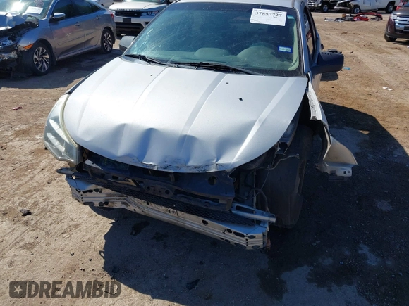 2008 Ford Focus SE z VIN 1FAHP35N18W162951, wystawiony jako IAAI lot #37857727 z przebiegiem 158 792 mil mil oraz . Historia ofert i sprzedaży dostępna na DreamBid. Obrazek 6.