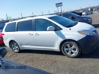 2013 Toyota Sienna LE AAS with VIN 5TDKK3DC2DS354582, listed as a IAAI auction lot 41360766 with 169,978 mi miles. Bid and sale history available at carsss.com. Image 13.