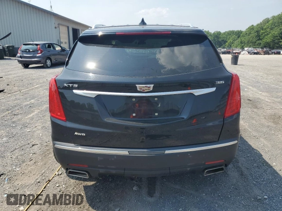 2019 Cadillac XT5 Premium Luxury AWD with VIN 1GYKNFRS9KZ223065, listed as a Copart auction lot 60902645 with 101,168 mi miles and Salvage title. Bid and sale history available at DreamBid. Image 6.