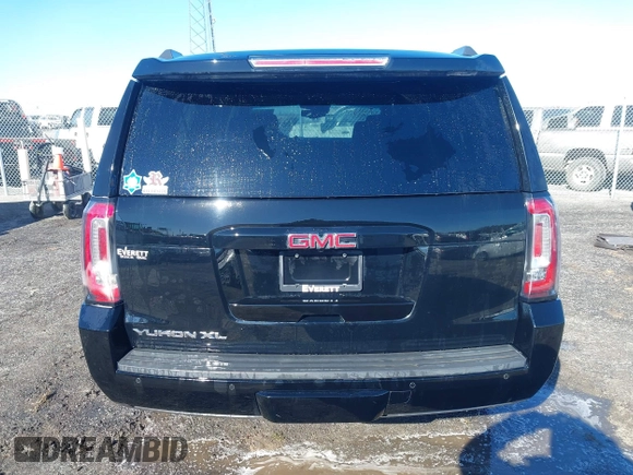 2016 GMC Yukon XL SLT with VIN 1GKS2GKC0GR443634, listed as a IAAI auction lot 41379064 with 121,744 mi miles. Bid and sale history available at carsss.com. Image 16.
