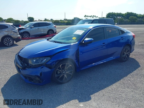 2019 Honda Civic Sport with VIN 19XFC2F83KE014463, listed as a IAAI auction lot 41439533 with 84,379 mi miles and . Bid and sale history available at DreamBid. Image 2.