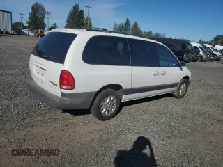 2000 Dodge Caravan SE with VIN 1B4GP44L3YB734876, listed as a Copart auction lot 72469374 with 215,240 mi miles and Salvage Title. Bid and sale history available at carsss.com. Image 3.