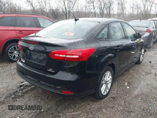 2016 Ford Focus SE z VIN 1FADP3F25GL386582, wystawiony jako IAAI lot #41097395 z przebiegiem 101 479 mil mil oraz . Historia ofert i sprzedaży dostępna na DreamBid. Obrazek 4.