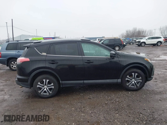 2018 Toyota RAV4 LE with VIN 2T3BFREV2JW788700, listed as a IAAI auction lot 41986212 with 87,704 mi miles. Bid and sale history available at carsss.com. Image 12.