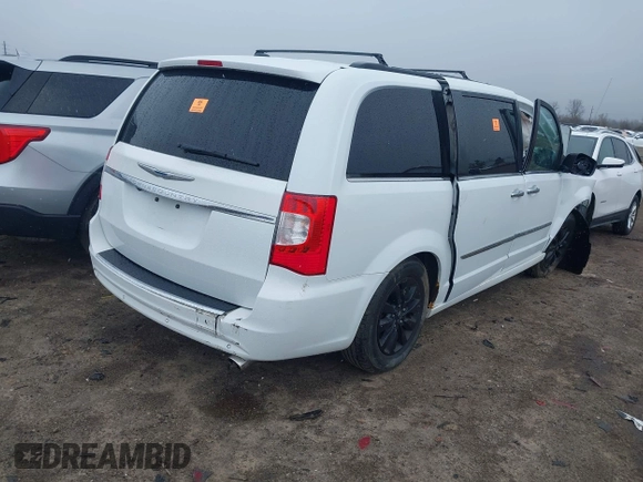 2014 Chrysler Town & Country Touring L with VIN 2C4RC1CG2ER189177, listed as a IAAI auction lot 41978563 with Not Provided miles and . Bid and sale history available at DreamBid. Image 4.