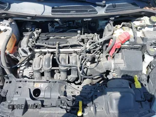 2016 Ford Fiesta S z VIN 3FADP4TJXGM171098, wystawiony jako IAAI lot #42239269 z przebiegiem 93 634 mil mil oraz . Historia ofert i sprzedaży dostępna na DreamBid. Obrazek 10.