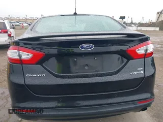 2016 Ford Fusion SE Hybrid with VIN 3FA6P0LU5GR356433, listed as a IAAI auction lot 41799204 with 157,670 mi miles. Bid and sale history available at carsss.com. Image 16.