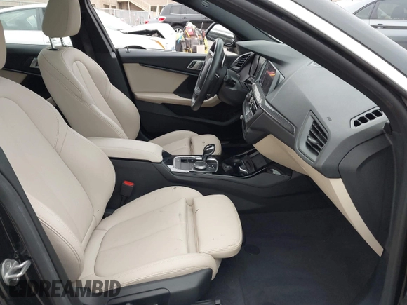 2020 BMW 2 Series 228i xDrive with VIN WBA73AK01L7F85126, listed as a IAAI auction lot 42110803 with 33,411 mi miles and . Bid and sale history available at carsss.com. Image 5.