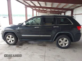 2012 Jeep Grand Cherokee Limited z VIN 1C4RJFBT1CC312006, wystawiony jako IAAI lot #42247170 z przebiegiem 233 890 mil mil oraz . Historia ofert i sprzedaży dostępna na DreamBid. Obrazek 14.