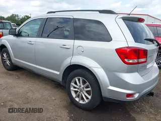 2013 Dodge Journey SXT with VIN 3C4PDDBG4DT571469, listed as a IAAI auction lot 42104433 with 166,068 mi miles and . Bid and sale history available at DreamBid. Image 3.