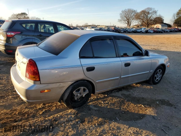 2003 Hyundai Accent GL with VIN KMHCG45C93U496038, listed as a Copart auction lot 87260904 with 104,251 mi miles and Salvage Title. Bid and sale history available at carsss.com. Image 3.