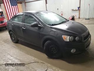 2014 Chevrolet Sonic LTZ with VIN 1G1JE5SB8E4213028, listed as a Copart auction lot 43561105 with 81,457 mi miles and Salvage Title. Bid and sale history available at carsss.com. Image 4.