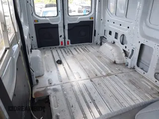2017 Ford Transit Cargo with VIN 1FTYE1CM4HKA22561, listed as a IAAI auction lot 42118744 with 181,113 mi miles and . Bid and sale history available at DreamBid. Image 8.