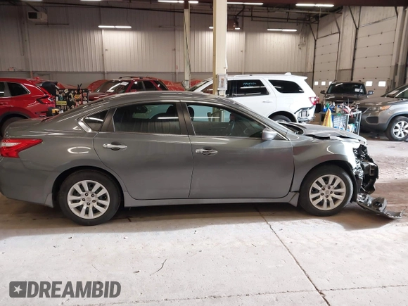 2016 Nissan Altima S z VIN 1N4AL3AP5GN343706, wystawiony jako IAAI lot #42001606 z przebiegiem 66 020 mil mil oraz . Historia ofert i sprzedaży dostępna na DreamBid. Obrazek 13.