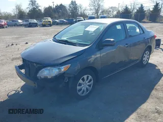 2011 Toyota Corolla L with VIN 2T1BU4EE1BC674644, listed as a IAAI auction lot 41876165 with 128,830 mi miles. Bid and sale history available at carsss.com. Image 2.