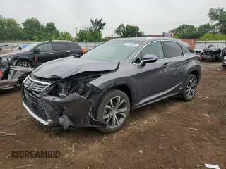 2017 Lexus RX 450h with VIN 2T2BGMCA8HC017609, listed as a Copart auction lot 60404885 with 74,188 mi miles and Salvage title. Bid and sale history available at DreamBid. Image 1.