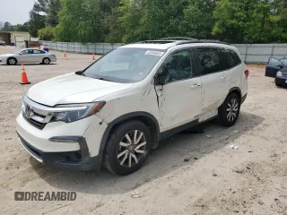 2019 Honda Pilot EX-L with VIN 5FNYF5H4XKB022940, listed as a Copart auction lot 52860545 with Not provided miles and Salvage title. Bid and sale history available at DreamBid. Image 1.