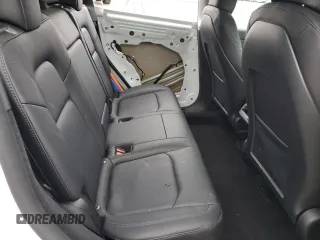 2023 Tesla Model Y Long Range z VIN 7SAYGDEE4PF836872, wystawiony jako Copart lot #45566235 z przebiegiem 7 674 mil mil oraz Szkoda całkowita • Salvage title. Historia ofert i sprzedaży dostępna na DreamBid. Obrazek 11.
