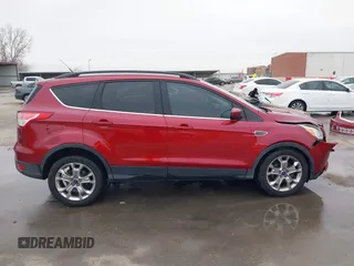 2015 Ford Escape SE with VIN 1FMCU0GXXFUC74470, listed as a IAAI auction lot 41419669 with 94,107 mi miles. Bid and sale history available at carsss.com. Image 13.