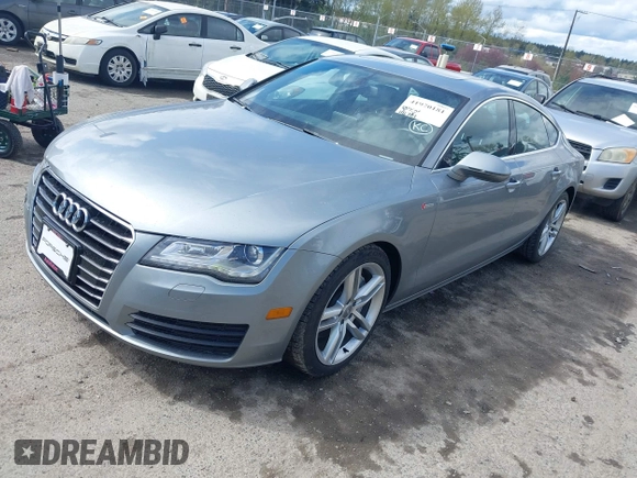 2014 Audi A7 Premium Plus z VIN WAUWGAFC4EN160144, wystawiony jako IAAI lot #41970181 z przebiegiem 118 761 mil mil oraz . Historia ofert i sprzedaży dostępna na DreamBid. Obrazek 17.