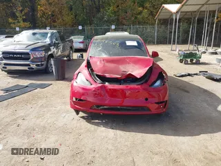 2023 Tesla Model Y Performance with VIN 7SAYGDEF6PF870935, listed as a IAAI auction lot 40718563 with 15,286 mi miles and . Bid and sale history available at DreamBid. Image 12.