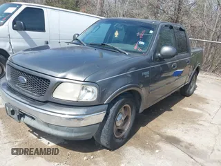 2003 Ford F-150 XLT with VIN 1FTRW076X3KA76379, listed as a IAAI auction lot 41821131 with 221,081 mi miles. Bid and sale history available at carsss.com. Image 6.