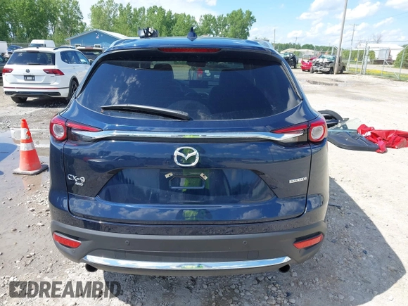 2021 Mazda CX-9 Grand Touring with VIN JM3TCBDY4M0513099, listed as a IAAI auction lot 42563530 with 76,006 mi miles and . Bid and sale history available at DreamBid. Image 17.