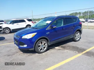 2013 Ford Escape SEL with VIN 1FMCU9H9XDUC19146, listed as a IAAI auction lot 42014526 with 167,600 mi miles. Bid and sale history available at carsss.com. Image 2.