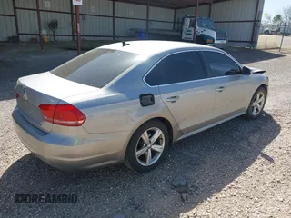 2013 Volkswagen Passat SE w/Sunroof with VIN 1VWBH7A35DC118355, listed as a IAAI auction lot 41835236 with 228,358 mi miles. Bid and sale history available at carsss.com. Image 4.