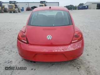 2014 Volkswagen Beetle Entry z VIN 3VWF17AT1EM638445, wystawiony jako Copart lot #62499104 z przebiegiem 85 895 mil mil oraz Szkoda całkowita • Salvage title. Historia ofert i sprzedaży dostępna na DreamBid. Obrazek 6.