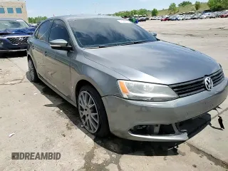 2012 Volkswagen Jetta SE z VIN 3VWDX7AJXCM396871, wystawiony jako Copart lot #57594565 z przebiegiem 45 604 mil mil oraz Szkoda całkowita • Salvage title. Historia ofert i sprzedaży dostępna na DreamBid. Obrazek 13.
