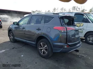 2018 Toyota RAV4 XLE with VIN JTMWFREV1JJ169926, listed as a IAAI auction lot 41464920 with 111,144 mi miles. Bid and sale history available at carsss.com. Image 3.