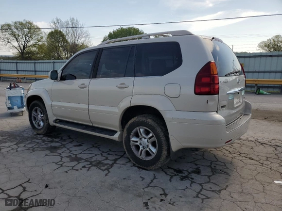 2003 Lexus GX 470 with VIN JTJBT20XX30010271, listed as a Copart auction lot 52812575 with 291,394 mi miles and Salvage Title. Bid and sale history available at carsss.com. Image 2.