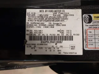 2010 Ford Fusion Hybrid with VIN 3FADP0L39AR140087, listed as a IAAI auction lot 41737705 with 118,563 mi miles. Bid and sale history available at carsss.com. Image 9.