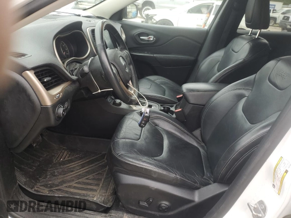 2014 Jeep Cherokee Limited z VIN 1C4PJMDB0EW275953, wystawiony jako Copart lot #53357755 z przebiegiem 114 163 mil mil oraz Szkoda całkowita • Salvage title. Historia ofert i sprzedaży dostępna na DreamBid. Obrazek 7.