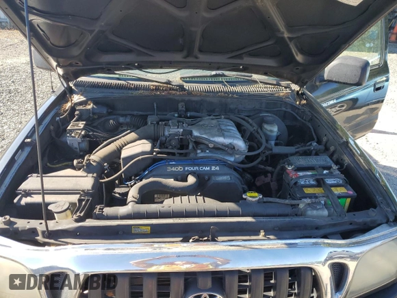 2004 Toyota Tacoma z VIN 5TEWN72N74Z389013, wystawiony jako Copart lot #55796005 z przebiegiem 199 637 mil mil oraz Czysty tytuł • Clean title. Historia ofert i sprzedaży dostępna na DreamBid. Obrazek 11.