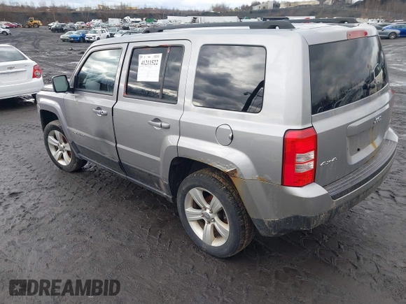 2014 Jeep Patriot Latitude with VIN 1C4NJRFB6ED778433, listed as a IAAI auction lot 41211522 with 127,506 mi miles. Bid and sale history available at carsss.com. Image 3.